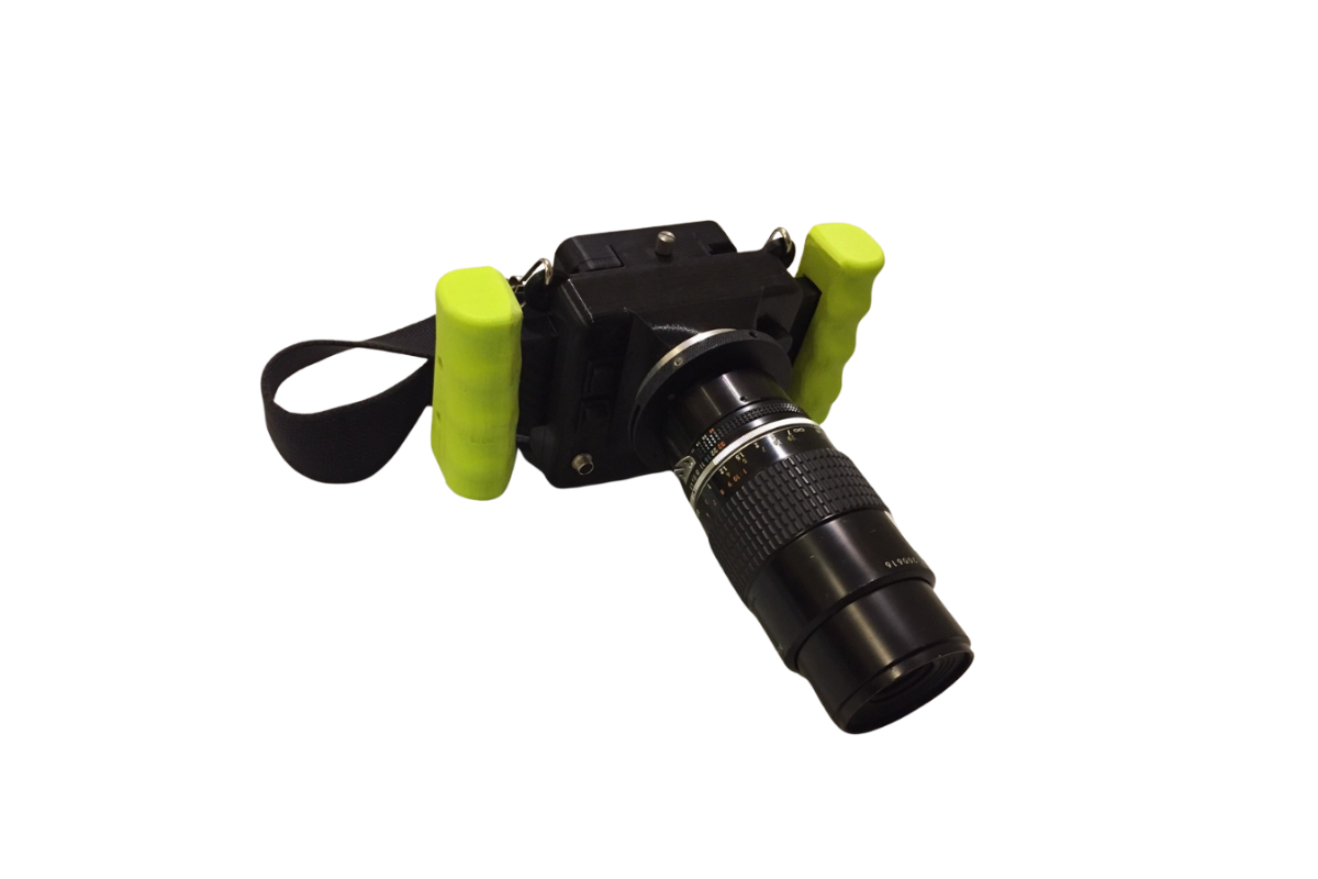 CRIS II body with mounted nikon lens and neckstrap