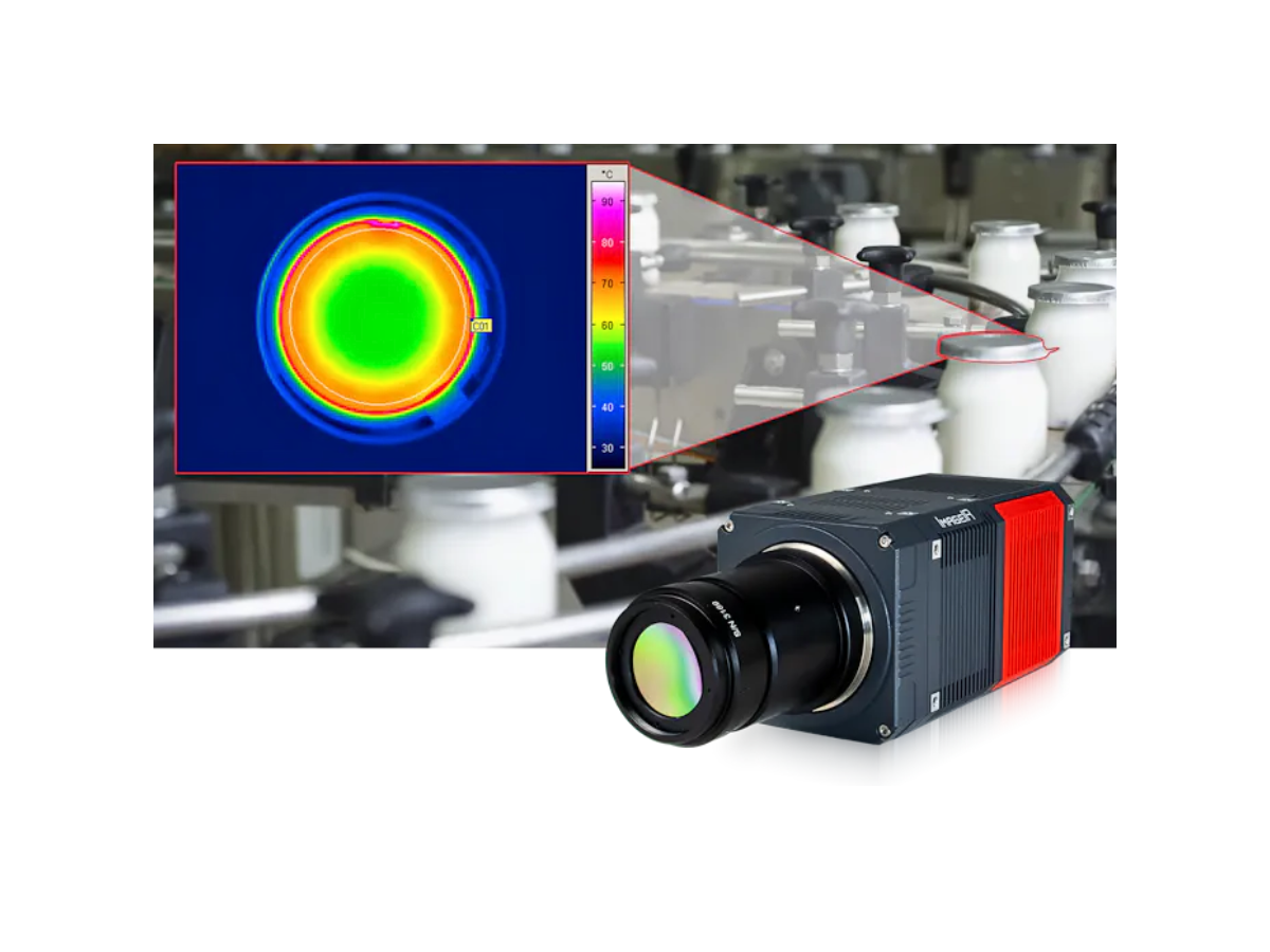 InfraTec ImageIR 6300 camera beside a conveyor belt moving glass jars of milk with an overlay of a thermal image of the top of the jar lid